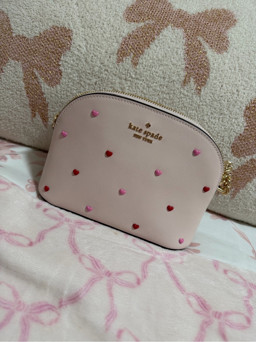 kate spade blush pink heart-studded crossbody